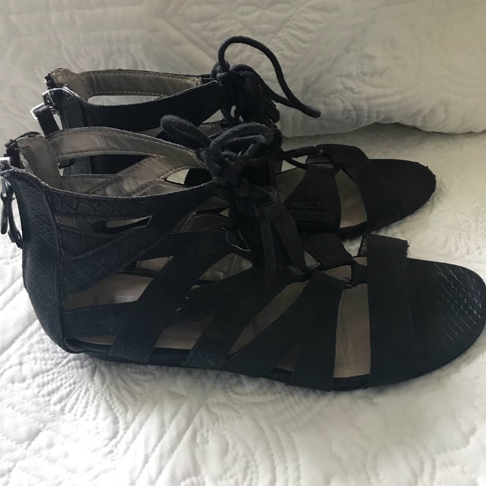 Black gladiator sandals w/ tassels